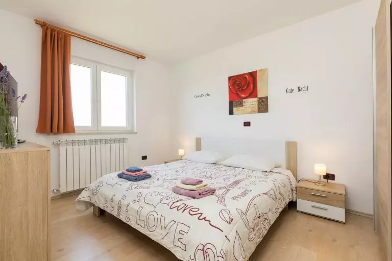 Apartments Barbara Novigrad Istria - double bed bedroom